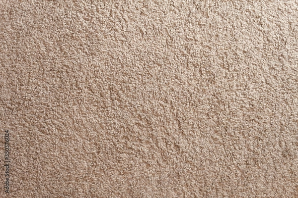 Fototapeta Beige carpet texture. Cozy soft floor at home