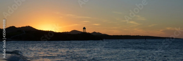 Fototapeta view of Dominican coast, with buildings and hills