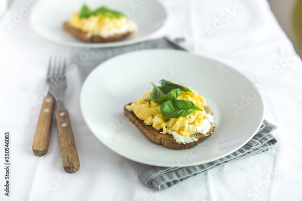 Fototapeta Toast with scrambled eggs