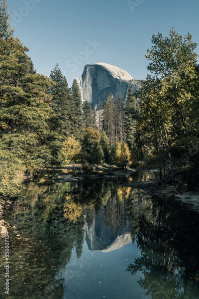 Fototapeta View of the Half Dome and the Merced River from the Sentinel Bridge in Yosemite National Park