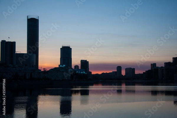 Fototapeta sunset over the city