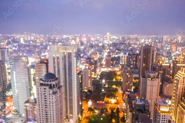 Fototapeta background of city skyline at night in aerial view