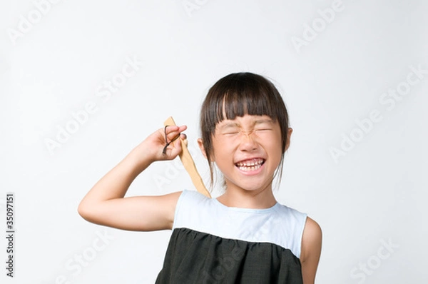 Obraz 背中を掻く女の子