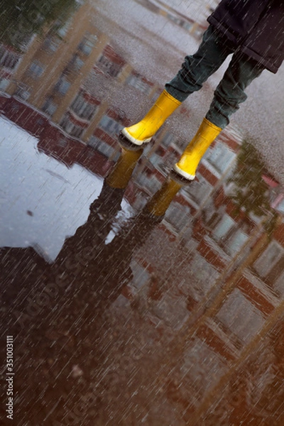 Obraz Boy in yellow boots in the rain