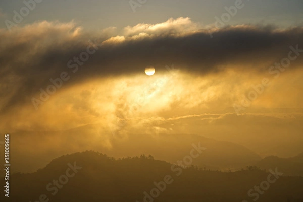 Fototapeta sunset in the clouds