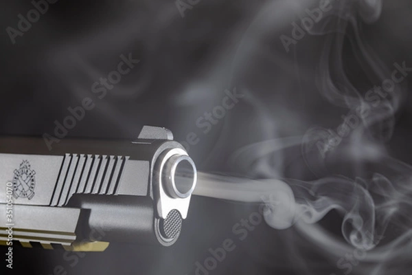 Obraz Springfield Operator 45 Cal with gun smoke