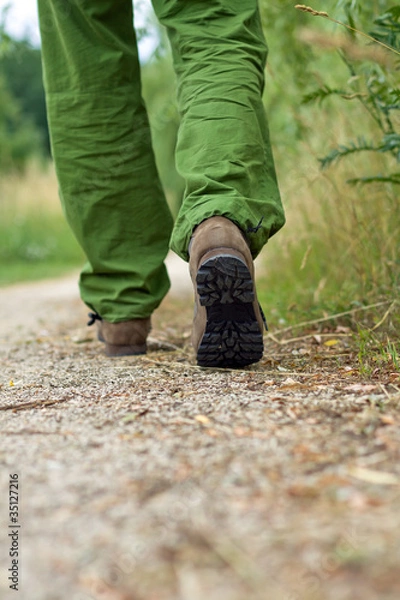 Fototapeta Man exercise walking in park