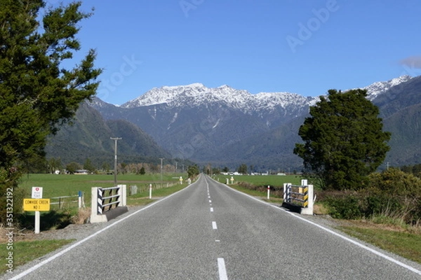 Fototapeta On Highway SH6 in New Zealand towards the Mount Cook Mountain Range between Greymouth and the Franz Josef Glacier Village