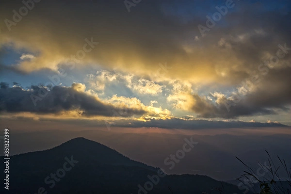 Fototapeta sunset over the mountains