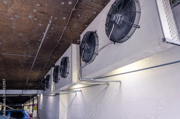Fototapeta Three external heat exchange units on the wall