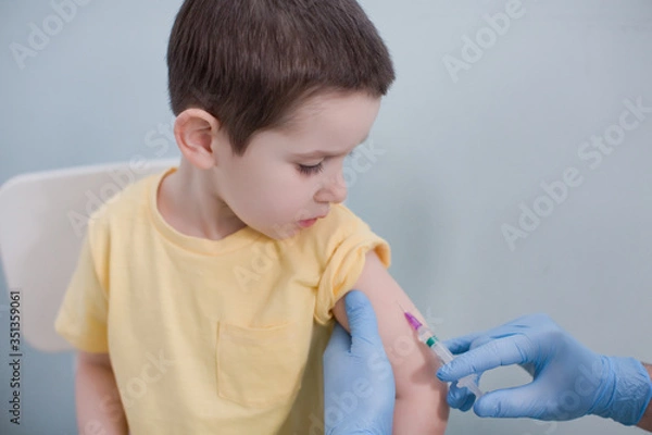 Obraz Vaccination concept with child in clinic