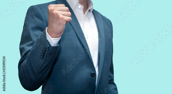 Fototapeta ガッツボーズをするビジネスマン
