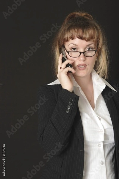 Fototapeta business woman on cell phone