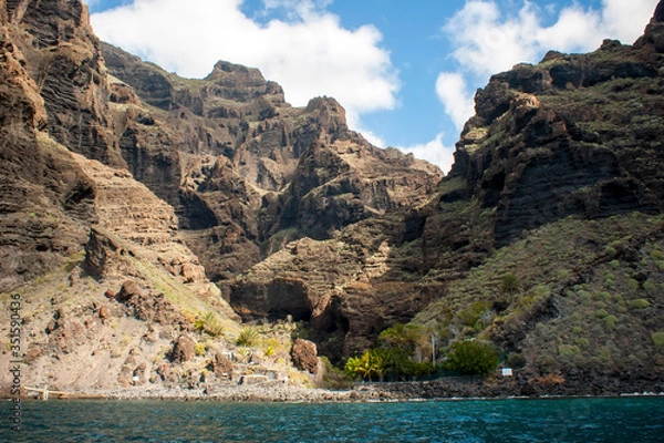 Fototapeta View of the Masca gorge from the ocean. The end of the trail along the Masca gorge.