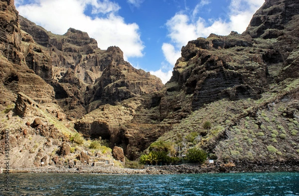 Fototapeta View of the Masca gorge from the ocean. The end of the trail along the Masca gorge.