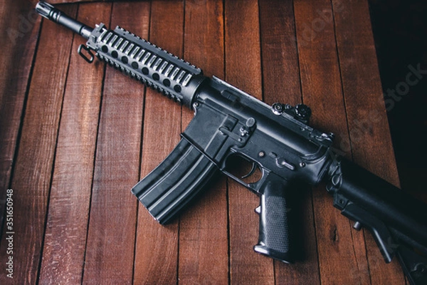 Obraz rifle on the table assault weapon