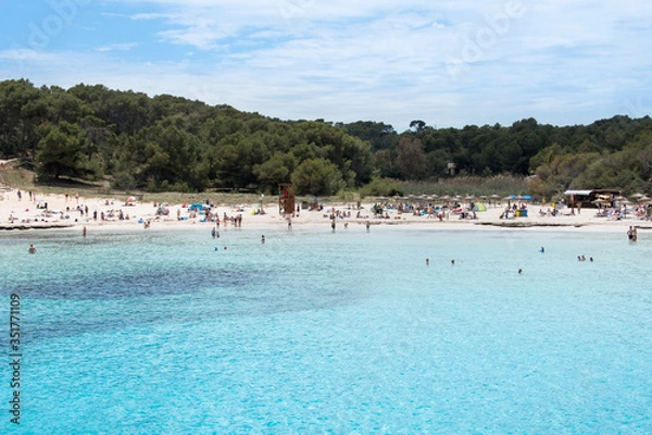 Fototapeta Beach with people and sea landscape in Santanyi, Majorca