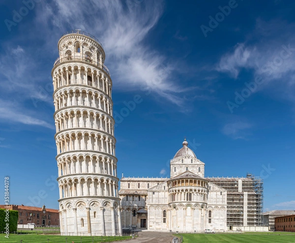 Fototapeta The famous Piazza dei Miracoli square and the leaning tower, in the historic center of Pisa, Italy, completely deserted due to the Covid-19 coronavirus pandemic