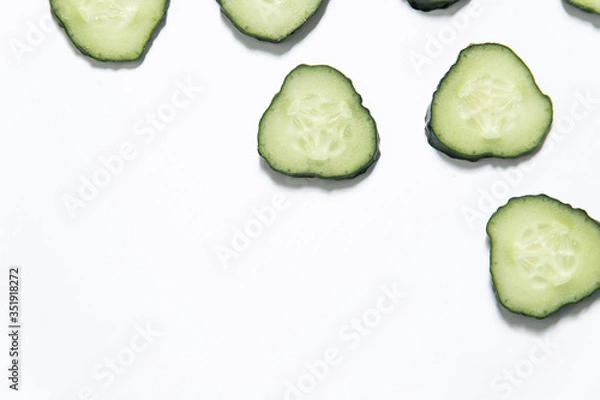 Fototapeta Cucumber slice background. Top view