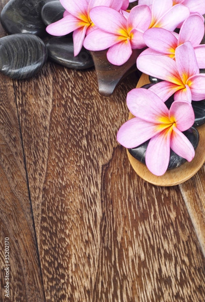 Obraz Tropical spa concept with Plumeria flower and pabble stone