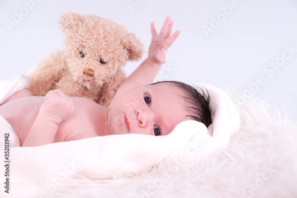 Fototapeta bébé et son doudou