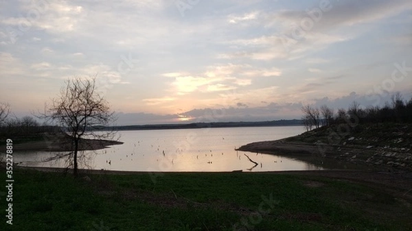 Fototapeta sunset over the river