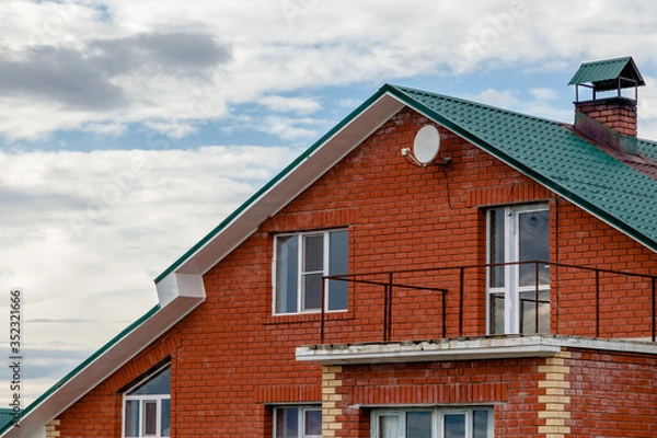 Obraz red brick house with sky