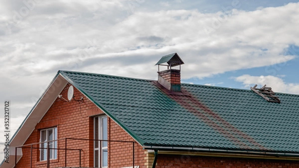 Obraz red roof with chimney