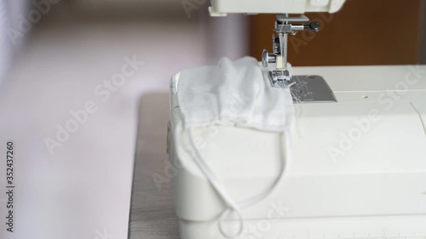 Obraz Electric sewing machine with fabric and thread