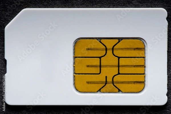 Obraz Sim card on a black background.