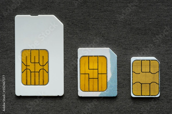 Obraz Sim card on a black background.