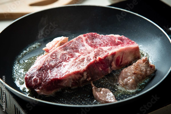 Fototapeta Wagyu Japanese beef steak frying on the pan