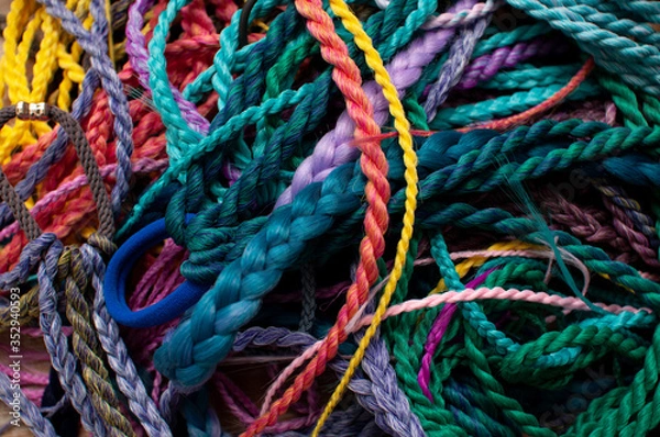 Fototapeta Hair ornament - afro-elastic from colored synthetic fiber