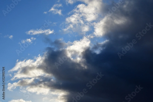Fototapeta Clouds with dramatic clouds against a blue cloudy sky.