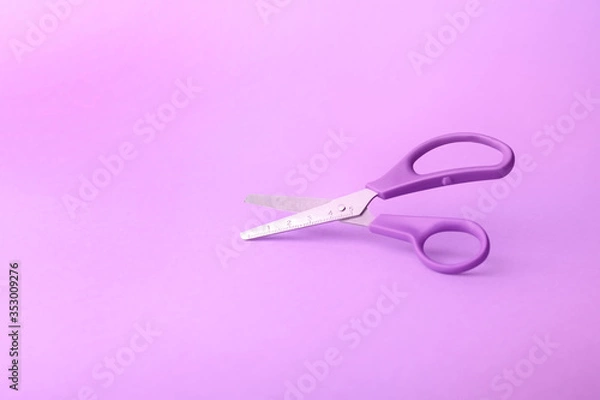 Fototapeta Scissors for paper on color background