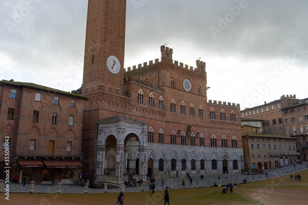 Fototapeta View of the famous " Piazza del Campo" ( Square of Campo) and "Palazzo Pubblico" ( Public Palace) in the city of Siena, Tuscany, Italy