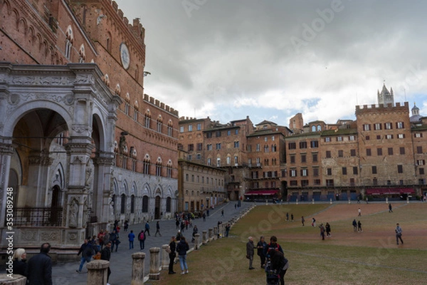 Fototapeta View of the famous " Piazza del Campo" ( Square of Campo) and "Palazzo Pubblico" ( Public Palace) in the city of Siena, Tuscany, Italy