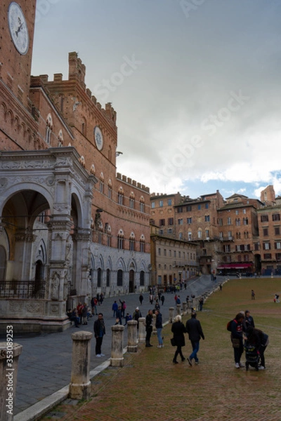 Fototapeta View of the famous " Piazza del Campo" ( Square of Campo) and "Palazzo Pubblico" ( Public Palace) in the city of Siena, Tuscany, Italy