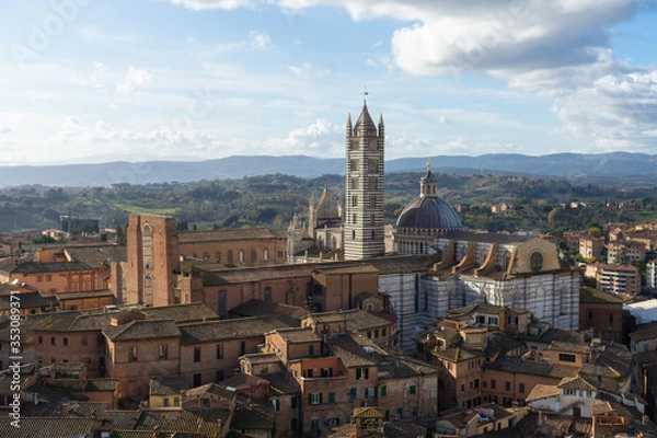 Fototapeta View of the Duomo and the city of Siena from the top of the tower of Mangia, Tuscany, Italy