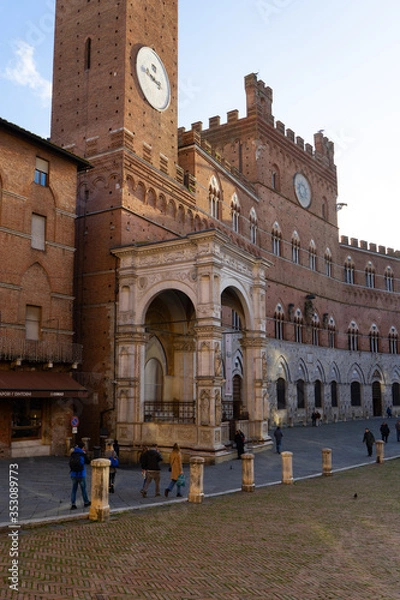 Fototapeta View of the famous " Piazza del Campo" ( Square of Campo) and "Palazzo Pubblico" ( Public Palace) in the city of Siena, Tuscany, Italy