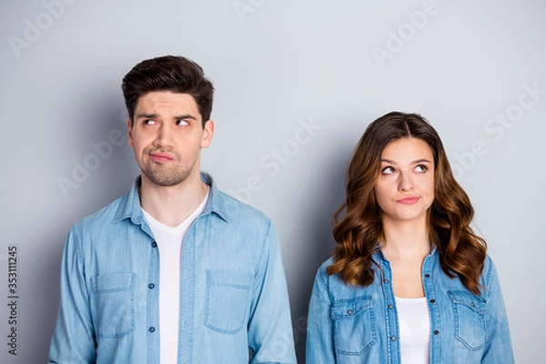 Fototapeta Portrait of pensive unaware spouses fellows look copyspace think thoughts decide freelance decisions choose choice solution wear casual style outfit isolated over gray color background