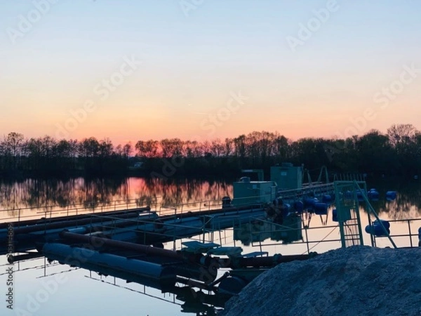 Fototapeta sunset over the river