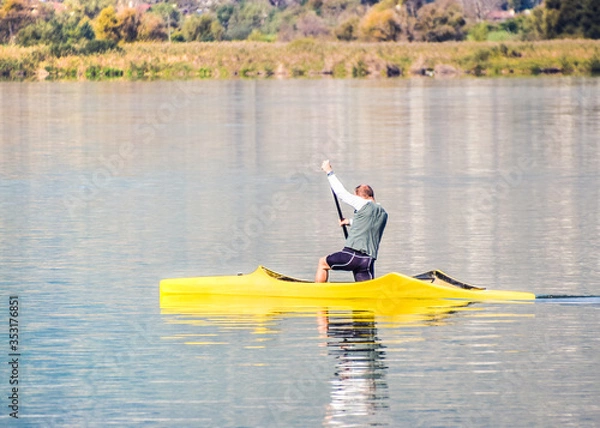 Fototapeta Single Rower At The Lake On A Sunny Day