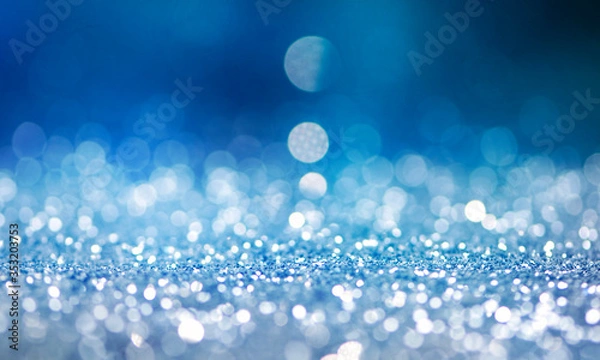 Obraz Christmas light background.  Holiday glowing backdrop. Defocused Background With Blinking Stars. Blurred Bokeh.