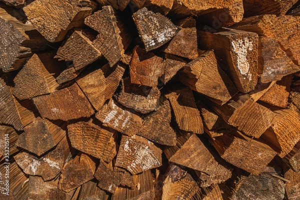 Fototapeta Firewood logs from a cut trees for camping and cabins in the surrounding mountain area.