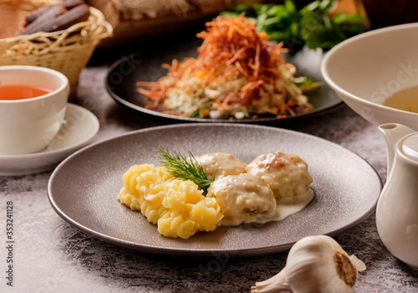 Obraz set of various plates of food top view, lunch. Spaghetti pasta carbonara, salad, meatballs, mashed potatoes, traditional creamy gravy, bread, tea. Healthy and mouth-watering three variation lunch.