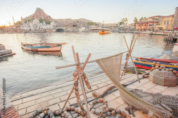 Obraz Fishing village, fishing port and colorful traditional fishmen's boat on sea, Port view at sunset.  Travel concept with wonderful destination.  sailing boats at wharf marina pier.