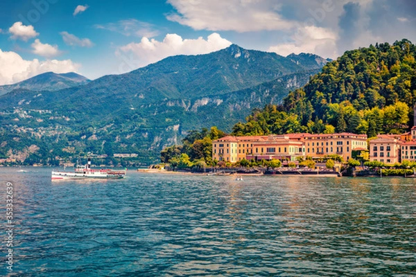 Fototapeta Colorful summer cityscape of Bellagio town, view from ferry boat. Tourist boat on Como lake, Italy, Europe. Traveling concept background.