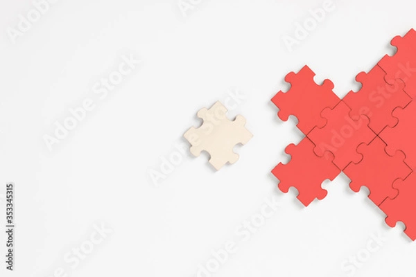 Fototapeta Flat lay, Puzzles isolate from Red puzzles connect together effect to transmission of infection, Social distancing and protect COVID-19 or coronavirus outbreak spreading concept