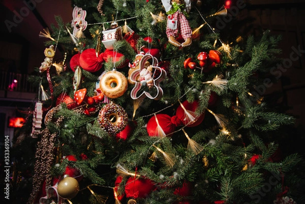 Obraz christmas tree with decorations with donuts